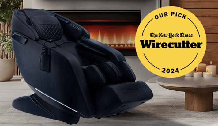 A black Kyota Genki M380 massage chair sits in a living room in front of a fireplace. A yellow seal claiming the Kyota Genki is a top 2024 pick for the New York Times Wirecutter is superimposed on the image.