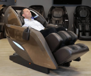 A-member-of-the-Massage-Chair-Review-Team-reclines-in-a-bronze-Kyota-Yutaka-M898-4D-massage-chair.
